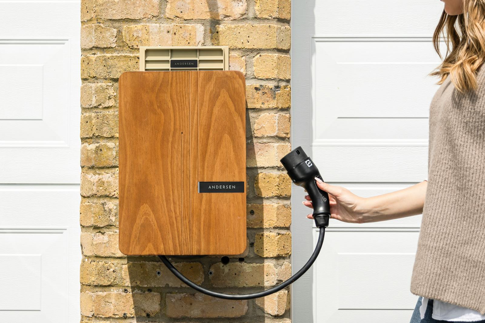 Stylish and functional home EV charger, blending seamlessly with modern home exteriors.