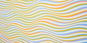 Colorful wavy lines creating an abstract and vibrant background pattern.