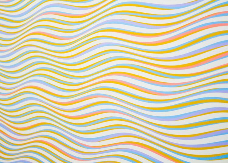 Colorful wavy lines creating an abstract and vibrant background pattern.