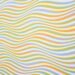 Colorful wavy lines creating an abstract and vibrant background pattern.