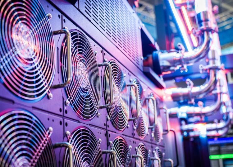Close-up of server cooling fans in a vibrant data center