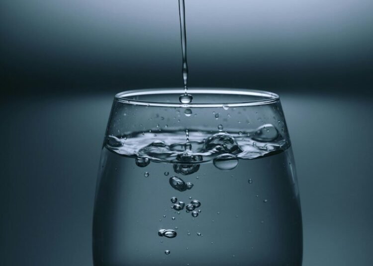 glass of water pouring