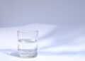 glass of water sunlight table