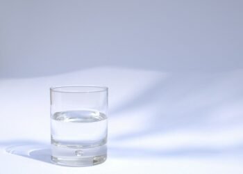 glass of water sunlight table