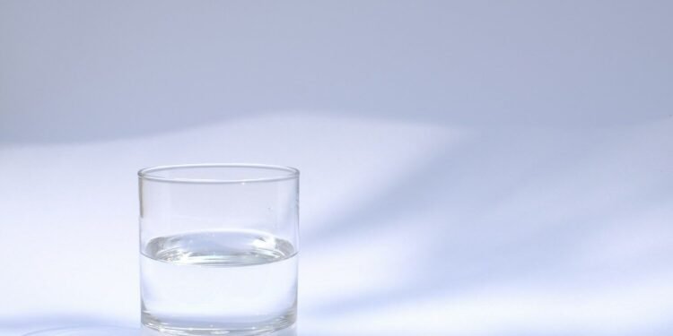 glass of water sunlight table
