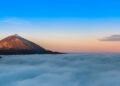 Mountain Peak Above Clouds photo