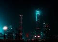 Neon lit city street at night