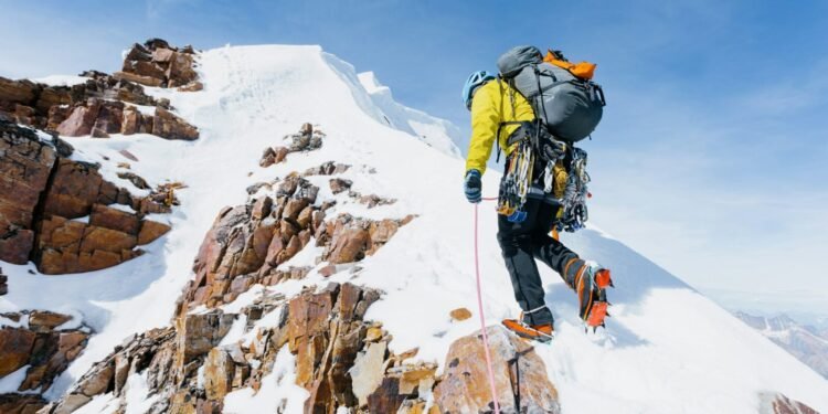 Climber Summit Mountain photo