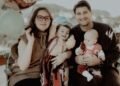 A joyful family of four celebrating outdoors, Positive Phil