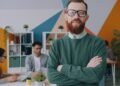 A confident professional in a creative office, Positive Phil