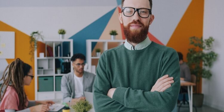 A confident professional in a creative office, Positive Phil