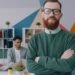 A confident professional in a creative office, Positive Phil