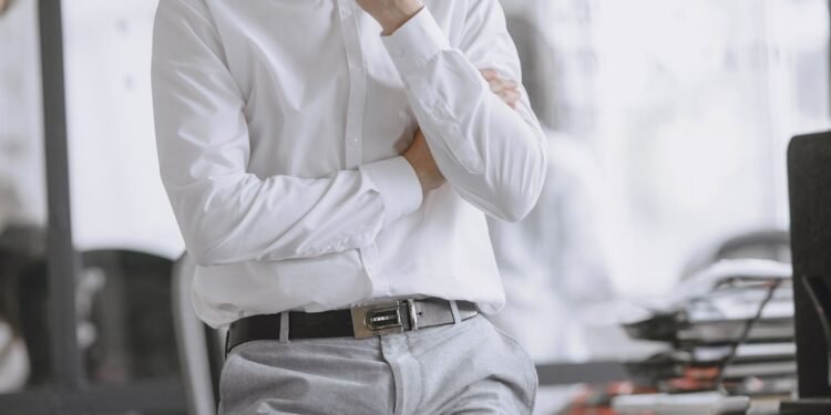 A business professional in a bright office, Positive Phil