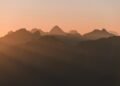 silhouette of mountains during golden hour