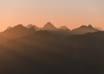 silhouette of mountains during golden hour