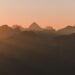silhouette of mountains during golden hour