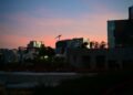 City skyline at dusk with colorful sky